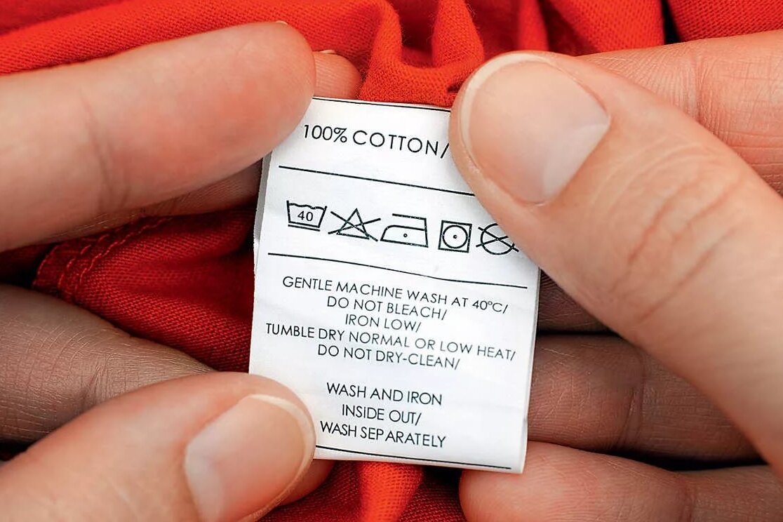 Значение зачеркнутого треугольника на одежде