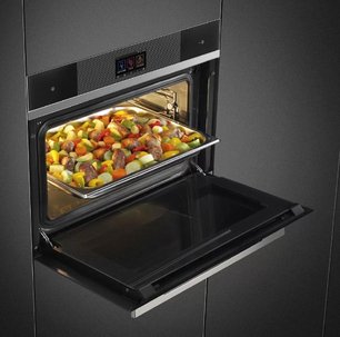 Компактный духовой шкаф с пароваркой Смег SF4104WVCPN фото 3 в Тюмени Компактный духовой шкаф с пароваркой Smeg SF4104WVCPN фото 3 в Тюмени