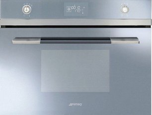 Компактный духовой шкаф с пароваркой Смег SF4120VCS фото в Тюмени Компактный духовой шкаф с пароваркой Smeg SF4120VCS фото в Тюмени