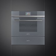 Компактный духовой шкаф с пароваркой Smeg SF4104VCS фото 2 в Тюмени
