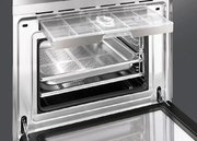 Компактный духовой шкаф с пароваркой Smeg SF4920VCN фото 3 в Тюмени