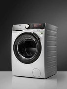 Стирально-сушильная машина AEG L8WBC61S фото 2 в Тюмени