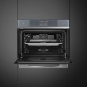 Компактный духовой шкаф с пароваркой Smeg SF4104WVCPS фото 4 в Тюмени