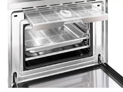 Компактный духовой шкаф с пароваркой Smeg SF4750VCBS фото 2 в Тюмени