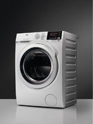 Стирально-сушильная машина AEG L7WBG47WR фото 2 в Тюмени
